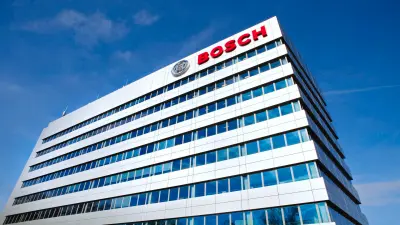 An impressive, modern office building serving as the headquarters or a significant branch of Bosch. The Bosch logo prominently adorns the facade, underscoring the company's size and established presence. This image signals stability, innovation, and global reach, key attributes for partners like Origify who leverage or collaborate with Bosch's expertise and infrastructure to develop advanced anti-counterfeiting technologies.