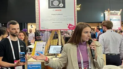 Picture of our booth with two experts presenting on the Viva Technology fair